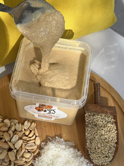 میکس بدنسازی خالص طبیعی (بادام زمینی، نارگیل و کنجد) ۵۰۰ گرمی
